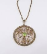 A 9ct pendant set with peridot and seed pearl set on fine 9ct chain, approx 13.8gms.