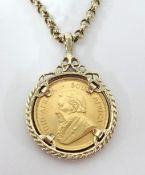 A gold 1981 1/4oz krugerrand mounted on a 9ct gold chain, total weight 23.90gms.