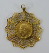 A Geo V full sovereign (P) set n a 9ct pendant ton a 9ct chain, total weight, approx 21gms.