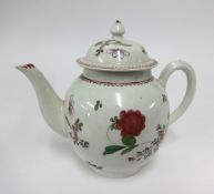 A 19th century Chinese porcelain teapot decorated with flowers.