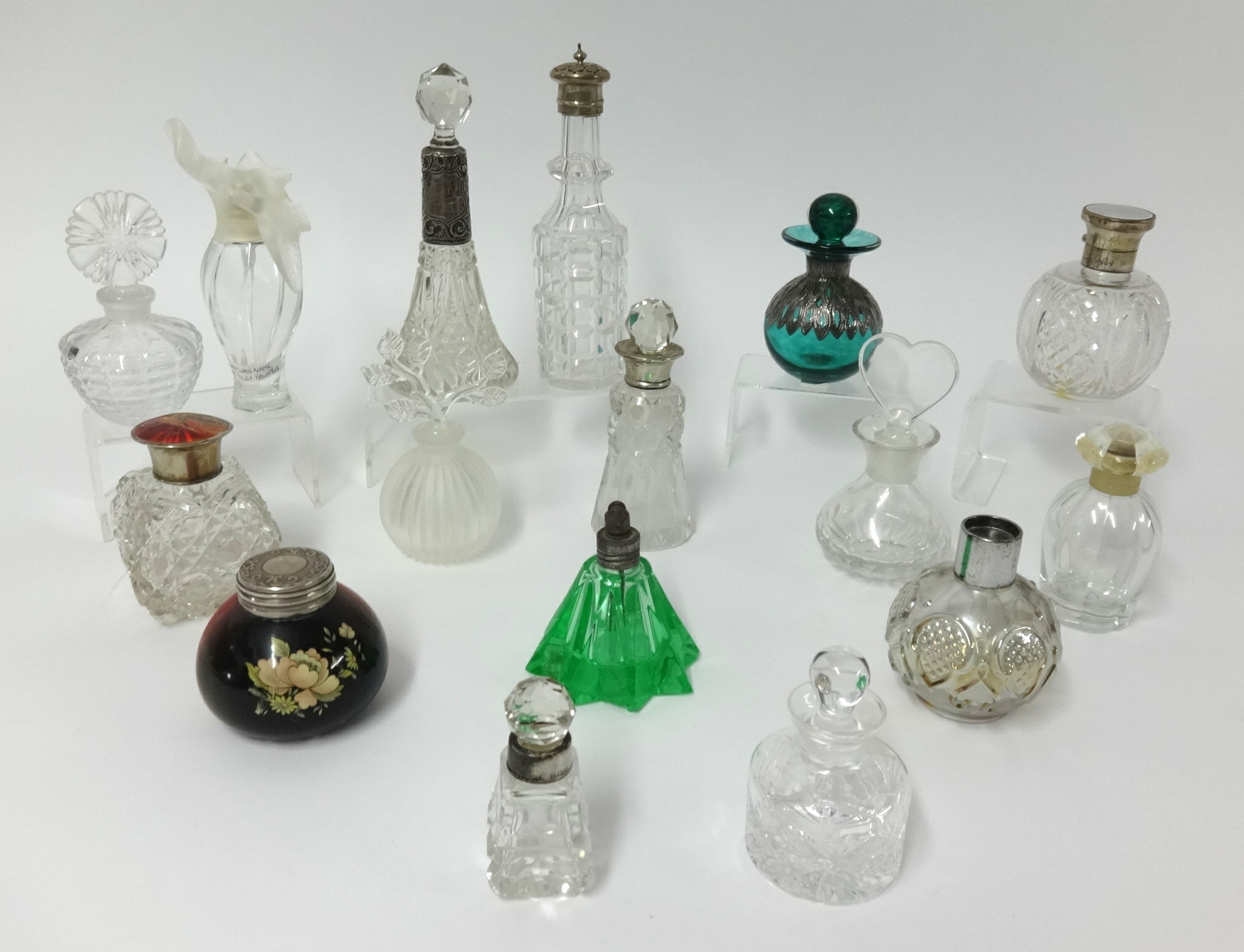 A collection of various glass and other perfume bottles including silver mounted, Siddy Langley, (