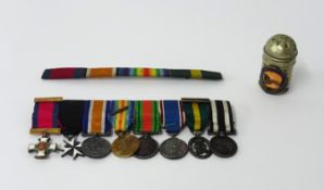 A set of eight miniature Great War medals including 'MID' and ribbon bar.