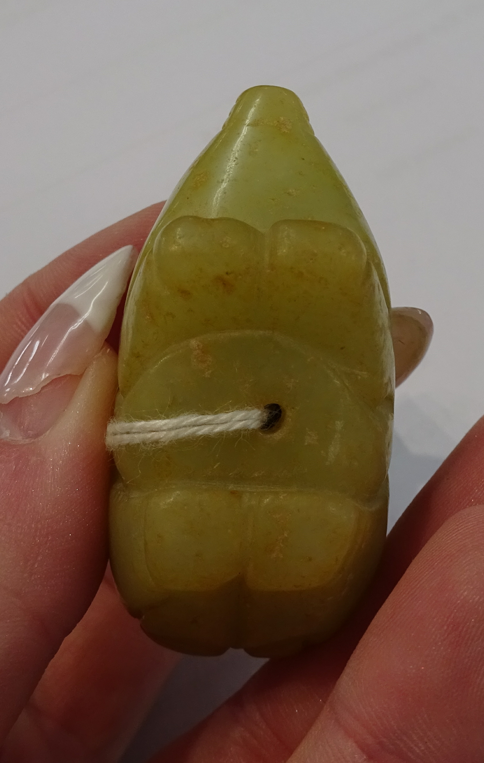 An oriental carved jade figure, a carved pig and dark green jade duck pendant, the tallest 7cm (3). - Image 8 of 10