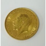 A Geo V gold sovereign, 1913.