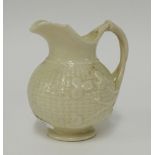 Belleek, a porcelain jug with basket decoration black mark 'Belleek' height 10cm