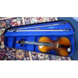 A Viola, cased with two bows.