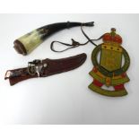 A horn powder flask, Royal Marine painted tin badge marked 'Tonanti', and an American hunting knife,