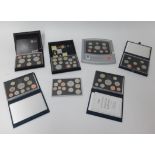 Royal Mint, six various year sets including 2009 also UK deluxe proof coin collection set, cased (