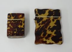 A Victorian tortoiseshell card case and a hinged box with match strike to the base (2).
