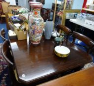 Early 20th century dining table, wind out with extension leaf.