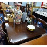 Early 20th century dining table, wind out with extension leaf.