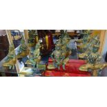 Seven gilded metal Alesia (Tibetan figures) on wood carving