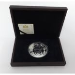 A 2013 Prince George 5oz silver coin with certificate, boxed.