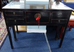 A pair reproduction Chinese lacquered side tables.