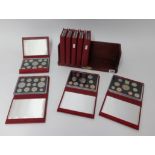 Royal Mint, nine various year sets, all cased.