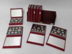 Royal Mint, nine various year sets, all cased.