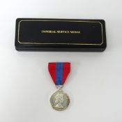 A QEII Faithful Service Medal, awarded to 'Mrs Elaine Hall'.