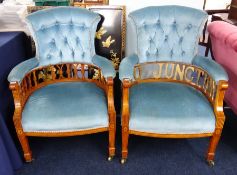 A pair of Edwardian upholstered armchairs with inlaid decoration one with replaced supports spelling