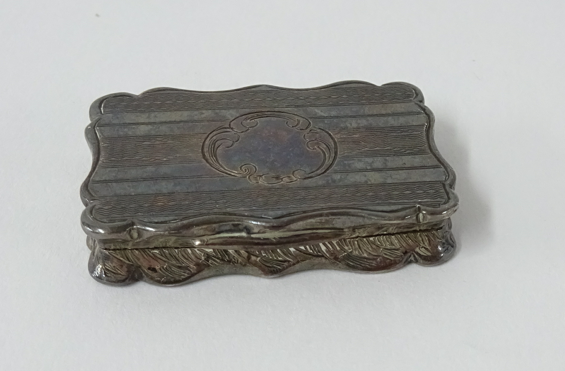 Early Victorian silver vinaigrette maker FM? approx 32mm x 20mm.