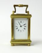 Miniature brass cased carriage clock, height 7cm.