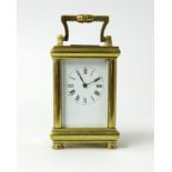 Miniature brass cased carriage clock, height 7cm.