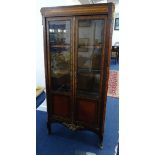 A French inlaid display cabinet.