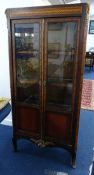 A French inlaid display cabinet.