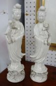 Pair of reproduction blanc de blanc figures, height 37cm.