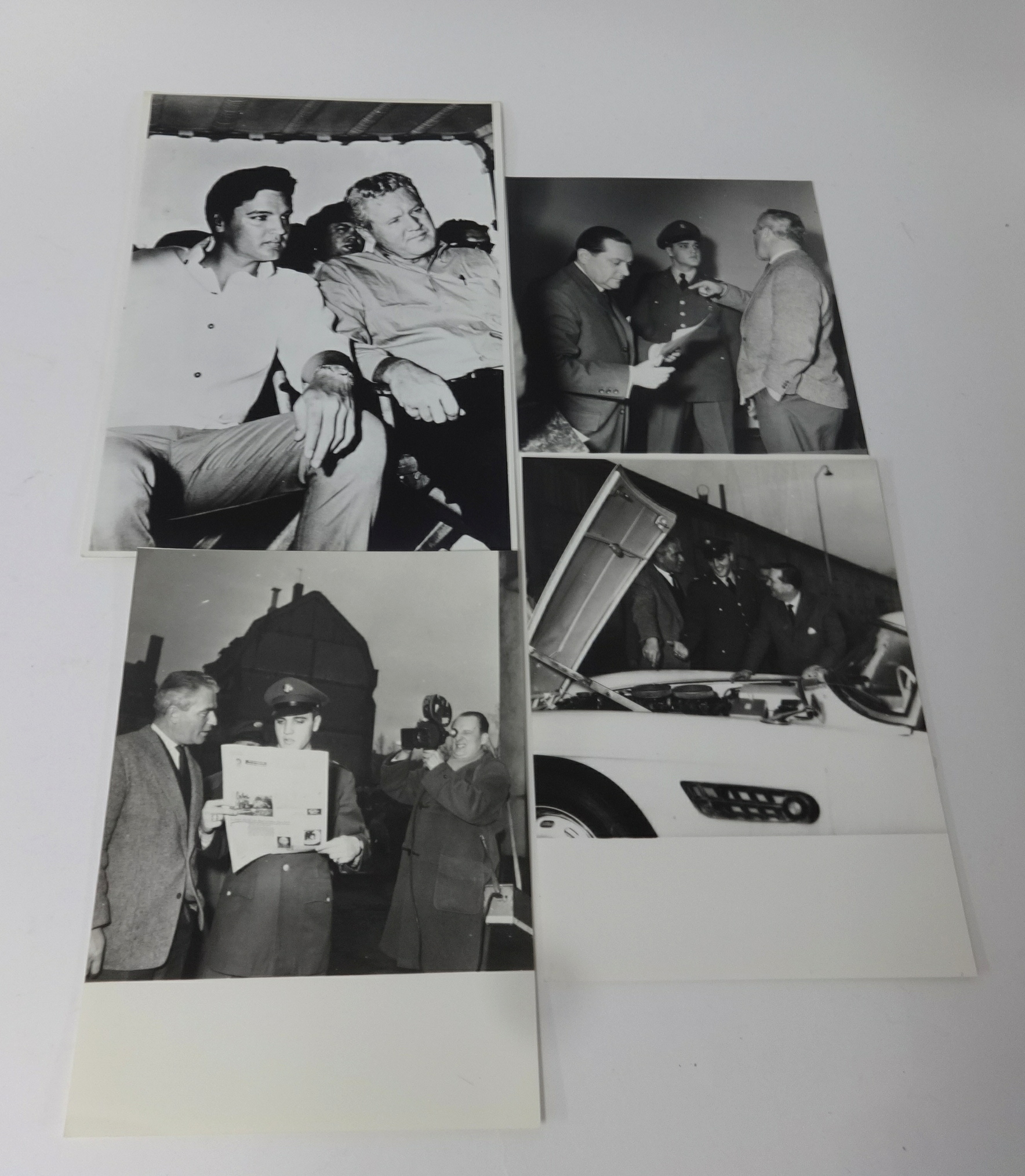 A collection of Elvis Presley photographs, originals and copies. This collection comprises somewhere