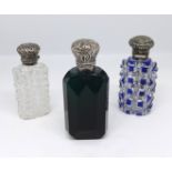 Three Victorian scent bottles including green glass, continental and clear glass and overlay blue (