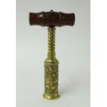 A 19th Century Thomason type double action cork screw with turned wood handle, embossed barrel