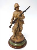 Doulton Lambeth salt glazed stoneware figure of a Boer War soldier, designed by John Broad, on socle