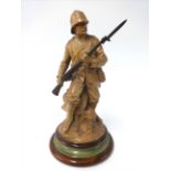 Doulton Lambeth salt glazed stoneware figure of a Boer War soldier, designed by John Broad, on socle