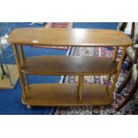 An Ercol three tier trolley.