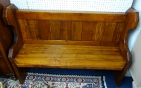 A pitch pine pew.