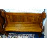 A pitch pine pew.