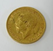 A Geo V gold sovereign, 1911.