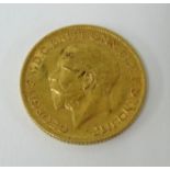 A Geo V gold sovereign, 1911.