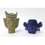 Two oriental carvings in green jade and lapis lazuli amulet, heights 9cm and 6cm.