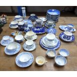 A collection of 19th century and later blue and white teacups and saucers including Royal Worcester,