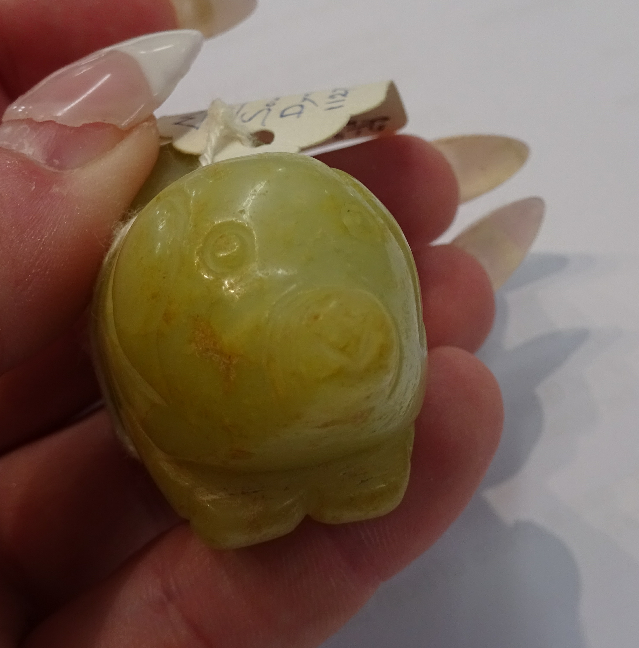 An oriental carved jade figure, a carved pig and dark green jade duck pendant, the tallest 7cm (3). - Image 7 of 10