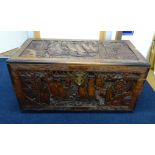 An oriental carved wood blanket chest