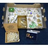 A collection of various costume jewellery mainly brooches and earrings some vintage.