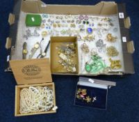 A collection of various costume jewellery mainly brooches and earrings some vintage.