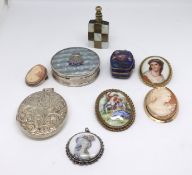 A collection including a silver oval locket, some cameos, H.M.S Damae compact, brooches and scent