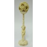 Chinese carved ivory puzzle ball on stand, height 23cm.