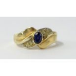 An 14ct sapphire and diamond ring (4.2gms).