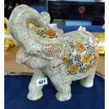 An Indian marble elephant inset with semi precious stones, height 27cm.