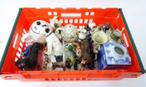 Quantity of ceramics and ornaments including a collection of novelty pig money banks, carved Swiss