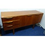 A 'retro' teak sideboard and two reproduction ‘sofa’ coffee tables (3).